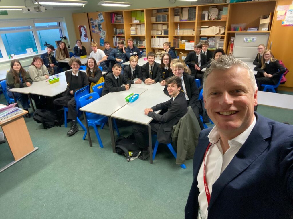 Luke with a students from Hele's - Year 8 to Year 13