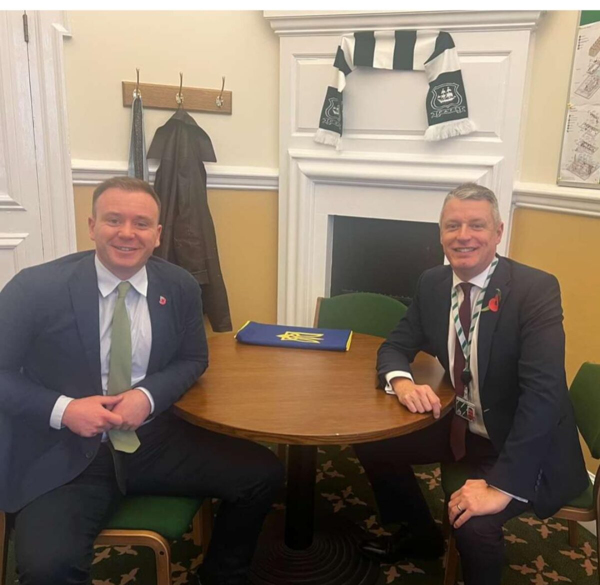 Luke Pollard and Fred Thomas sat at a meeting table  